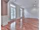 Bright living room featuring hardwood floors and beautiful windows at 139 Grandmar Chase, Canton, GA 30115