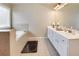 Bright bathroom featuring double vanity with modern fixtures and natural lighting at 4217 Brentwood Dr, Buford, GA 30518
