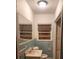 Functional bathroom with light-colored tile and sink with large mirror at 3238 Washington Rd, Atlanta, GA 30344