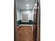Bright bedroom featuring wood floors, newly painted walls and a window at 3238 Washington Rd, Atlanta, GA 30344