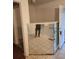 Open entryway with ceramic tile floor and mirrored walls at 3238 Washington Rd, Atlanta, GA 30344