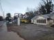 Street view of a single story home with painted siding and mature trees at 3238 Washington Rd, Atlanta, GA 30344