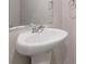 Close-up of a bathroom sink with a chrome faucet and a mirror in a neutrally decorated space at 3475 Ridge Hill Pkwy, Douglasville, GA 30135