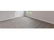 Secondary bedroom features neutral walls, carpet, and ample natural light at 3475 Ridge Hill Pkwy, Douglasville, GA 30135