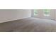 Bedroom featuring bright, natural light and neutral walls and carpet at 3475 Ridge Hill Pkwy, Douglasville, GA 30135