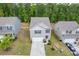 Charming two-story home with a welcoming front yard and attached garage, nestled in a peaceful neighborhood at 3475 Ridge Hill Pkwy, Douglasville, GA 30135