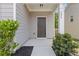 Inviting front porch with a classic door, manicured bushes, and house number displayed on the column at 3475 Ridge Hill Pkwy, Douglasville, GA 30135