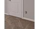 Neutral room featuring grey carpet, white walls, and a white door at 3475 Ridge Hill Pkwy, Douglasville, GA 30135