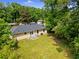 Spacious backyard with lush greenery and a well-maintained lawn, offering a private outdoor retreat at 4002 Lindsey Dr, Decatur, GA 30035