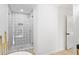 Updated bathroom showcasing a glass-enclosed shower with stylish tile work and gold fixtures at 4002 Lindsey Dr, Decatur, GA 30035