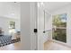 Walk-in closet with open door to main bedroom featuring plenty of light at 4002 Lindsey Dr, Decatur, GA 30035