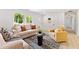 Cozy living room with stylish furnishings, hardwood floors, and a warm, inviting atmosphere at 4002 Lindsey Dr, Decatur, GA 30035