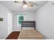 This bedroom features hardwood floors, light gray walls, and two windows at 844 Oak Nw St, Atlanta, GA 30318