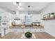 Modern kitchen features white cabinets, stainless steel appliances, and stylish countertops for a sleek design at 844 Oak Nw St, Atlanta, GA 30318