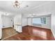 Open-concept living and kitchen area features hardwood floors, bright walls, and ample natural light at 844 Oak Nw St, Atlanta, GA 30318