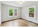 Bright bedroom with hardwood floors, neutral walls and natural light coming through the windows at 308 Mcpherson Se Pl, Atlanta, GA 30316