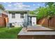 Back exterior featuring a cozy deck with steps down to the yard at 308 Mcpherson Se Pl, Atlanta, GA 30316