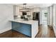 Modern kitchen featuring stainless steel appliances, stylish cabinetry, and a quartz countertop island at 308 Mcpherson Se Pl, Atlanta, GA 30316