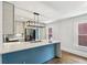 Sleek kitchen with modern appliances, a stylish island with quartz countertop, and ample cabinet space at 308 Mcpherson Se Pl, Atlanta, GA 30316