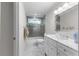 Modern bathroom with marble countertop and tiled shower at 3335 Ashton Dr, Suwanee, GA 30024