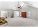 Large bedroom with vaulted ceilings, plush carpet, and abundant natural light at 3335 Ashton Dr, Suwanee, GA 30024