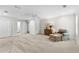 Large bedroom with an attached sitting area and bath access at 3335 Ashton Dr, Suwanee, GA 30024