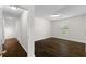 Cozy bedroom featuring hardwood floors, white walls, and natural light at 3335 Ashton Dr, Suwanee, GA 30024
