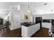 Gourmet kitchen featuring a large island with seating and pendant lighting at 3335 Ashton Dr, Suwanee, GA 30024