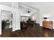 Open-concept living room featuring hardwood floors, a high ceiling, and plenty of natural light at 3335 Ashton Dr, Suwanee, GA 30024