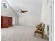 Bright, airy living room with vaulted ceilings, carpeted floors, and a ceiling fan at 3335 Ashton Dr, Suwanee, GA 30024