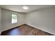 Cozy bedroom with hardwood flooring and natural light from the window at 3445 Huntington Ct, Douglasville, GA 30134