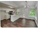 Bright eat-in kitchen with white cabinetry, stainless steel appliances, and a breakfast bar at 3445 Huntington Ct, Douglasville, GA 30134