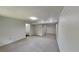 Spacious living room with neutral carpet, recessed lighting, and lots of natural light at 3445 Huntington Ct, Douglasville, GA 30134