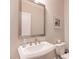 Powder room featuring a stylish sink, modern fixtures, and neutral wall paint at 3611 Ridgeway Rd, Duluth, GA 30096