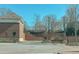 Inviting community entrance marked by brick signage and landscaped features, welcoming residents and guests at 3611 Ridgeway Rd, Duluth, GA 30096