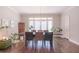 Formal dining room featuring hardwood floors and a stylish chandelier over the table at 3611 Ridgeway Rd, Duluth, GA 30096
