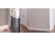 Hallway with wood floors and trim, white walls, a closet, and a railing overlooking the staircase at 3611 Ridgeway Rd, Duluth, GA 30096
