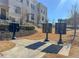 Street view of complex featuring personal mailboxes, brickwork, and landscaped entryway, enhancing curb appeal at 3611 Ridgeway Rd, Duluth, GA 30096