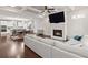 Bright living room with fireplace, coffered ceilings, and open floor plan to the kitchen at 435 Webb Dr, Norcross, GA 30071
