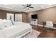Comfortable bedroom featuring a coffered ceiling, ceiling fan, and hardwood floors at 435 Webb Dr, Norcross, GA 30071