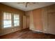 Spacious bedroom featuring natural light, a ceiling fan, and hardwood floors at 1388 Metropolitan Se Ave, Atlanta, GA 30316