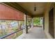 Covered front porch featuring wood floors and railing at 1388 Metropolitan Se Ave, Atlanta, GA 30316