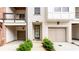 Charming townhome exterior with a garage and a quaint, welcoming entrance at 423 Burton Dr, Alpharetta, GA 30009
