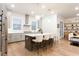 Well-lit kitchen with stainless steel appliances, white countertops, and an island with barstool seating at 423 Burton Dr, Alpharetta, GA 30009