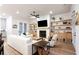 Bright living room features a fireplace, built-in shelves, and stylish decor at 423 Burton Dr, Alpharetta, GA 30009