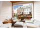 Comfortable outdoor patio with seating overlooking beautiful brick townhomes at 423 Burton Dr, Alpharetta, GA 30009