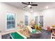 Bright and inviting playroom featuring unique decor, neutral color palette, and lots of natural light at 423 Burton Dr, Alpharetta, GA 30009