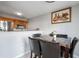 Open-concept dining area with a modern table and chairs next to kitchen at 6918 Gallant Se Cir # 22, Mableton, GA 30126