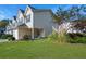 Beautiful exterior view of townhomes featuring well-maintained lawn and landscaped surroundings at 6918 Gallant Se Cir # 22, Mableton, GA 30126