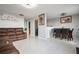 Open-concept living space with dining area, tile floors, and ample seating at 6918 Gallant Se Cir # 22, Mableton, GA 30126